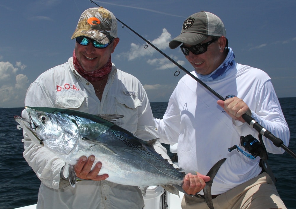 Anglers admire a lovely little tunny (false albacore) off Sebastian, Florida